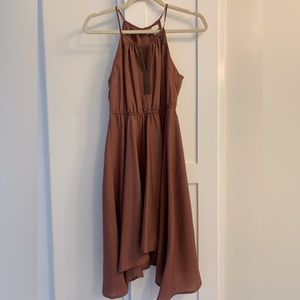 Dress with bead details. Comes with sash. Mauve color